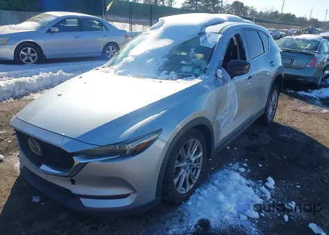 2020 Mazda Cx-5 Grand Touring z USA, uszkodzony, nr VIN JM3KFADMXL0733873